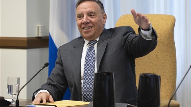 Pas de retour du masque obligatoire à court terme, dit Legault